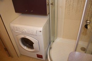 How to place a washing machine in the bathroom