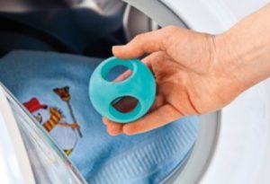 Magnetic ball for washing machine