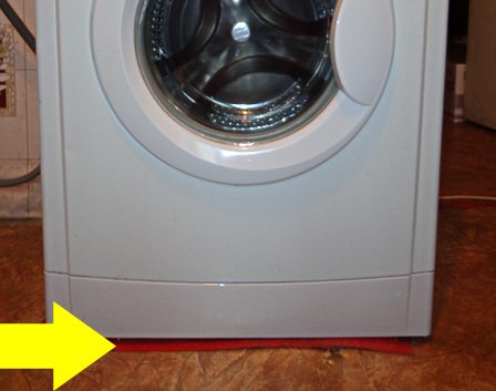 installing a washing machine on a wooden floor