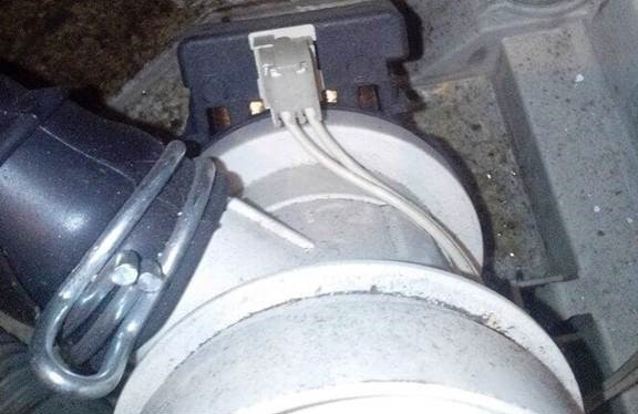 unhook the pipe and remove the terminals from the drain pump