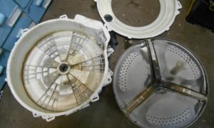 Dismantling a non-separable washing machine tank