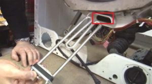 remove a foreign object through the heating element hole