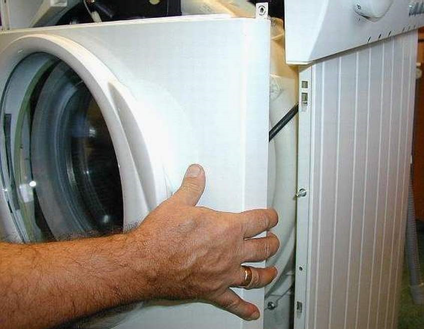 How to remove the front panel of a washing machine