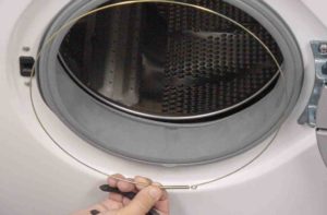 Removing the clamp on the washing machine