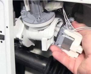 How to change the drain pump on an Atlant washing machine?