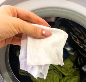 Why put a damp cloth in the washing machine when washing?