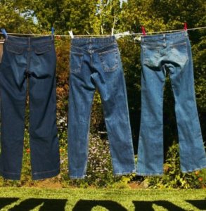 How to quickly dry jeans after washing?