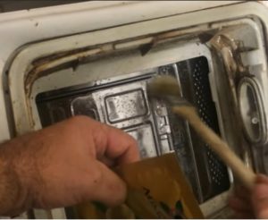 How to clean a top loading washing machine?