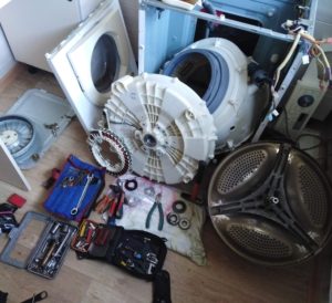 Is it worth replacing the bearings on a washing machine or is it better to buy a new one?