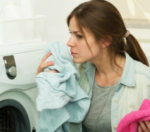 What should you do if your towels stink after washing?