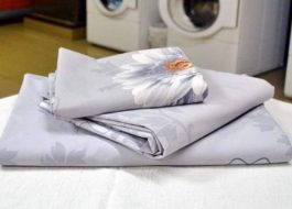 Paghuhugas ng poplin bed linen sa isang washing machine