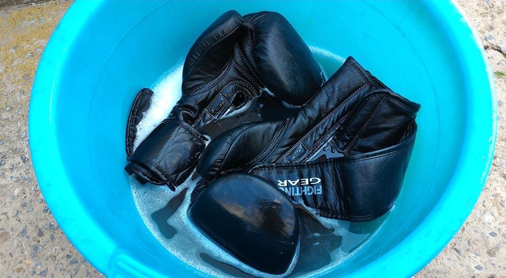 soak gloves in cold water