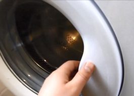 Hoe de deur van de Kandy-wasmachine te openen als de hendel kapot is