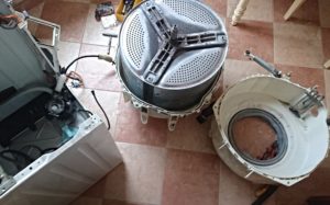 How to remove the drum on a Kandy washing machine?