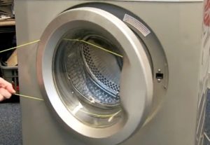 How to open the Kandy washing machine door?