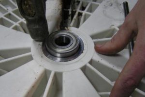 How to change bearings in a Whirlpool washing machine?