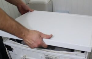 Paano buksan ang tuktok na takip ng Ardo washing machine?