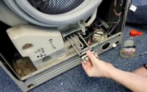 How to change the heating element on a Vestel washing machine?