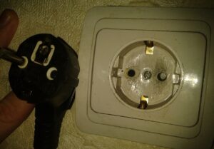 Why does the plug in the washing machine get hot?