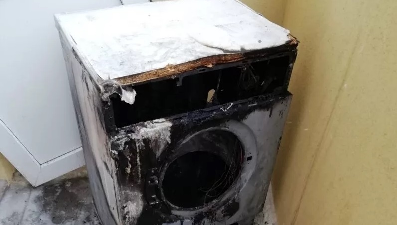 washing machine caught fire