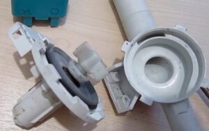 How does a washing machine drain pump work?