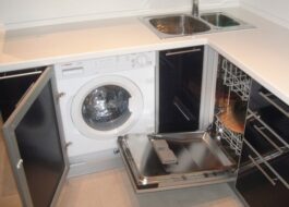 Kitchen with washing machine and dishwasher