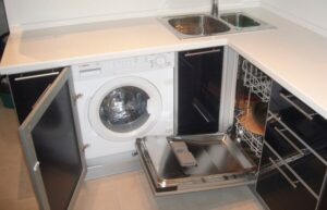 Kitchen with washing machine and dishwasher