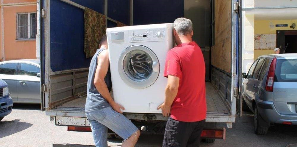 hand over the washing machine to buyers