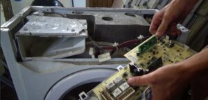 How to replace the control module in a washing machine?