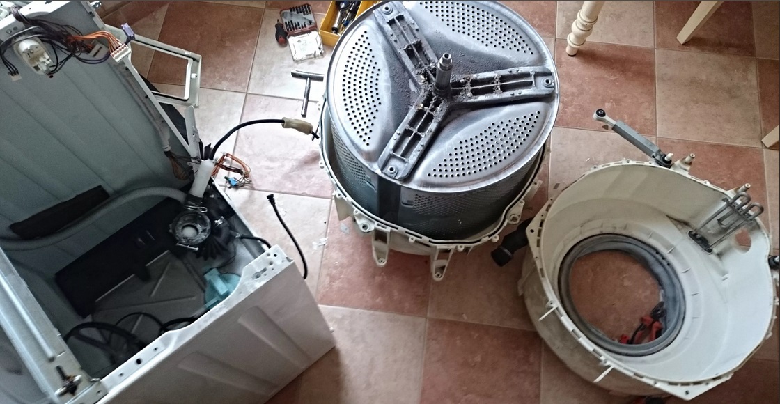 dismantling the washing machine tank