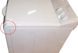 Top loading washing machine lid won't open