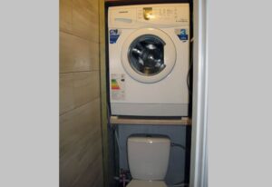 Placing the washing machine in the toilet