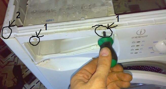 unscrew the screws near the powder receptacle