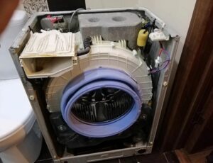 Disassembling the Haier washing machine