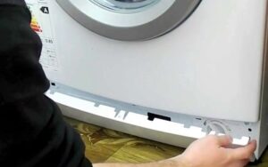 How to remove the bottom panel of an LG washing machine