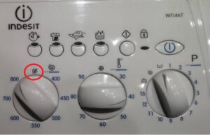 How to turn off the spin cycle in an Indesit washing machine