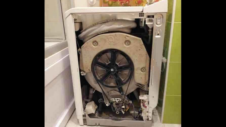 removing the side wall of a top-loading washing machine