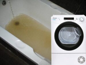 Water from the washing machine goes into the bathtub