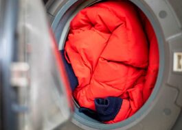 Do I need to turn my jacket inside out when washing it in the washing machine?