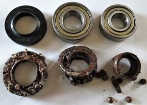 Mga palatandaan ng sirang washing machine bearing