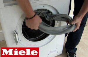 Reemplazo del brazalete en una lavadora Miele