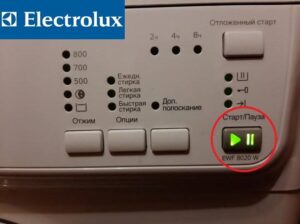 Le bouton démarrer clignote en vert sur une machine à laver Electrolux