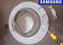 Desmuntant l'escotilla d'una rentadora Samsung