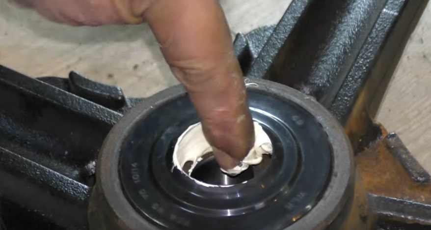 install the oil seal and add lubricant