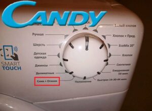 Turning on the spin cycle on the Candy washing machine