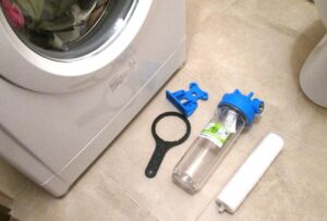 Replacing the water filter for a washing machine