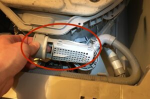 How to clean the filter in an Electrolux top-loading washing machine