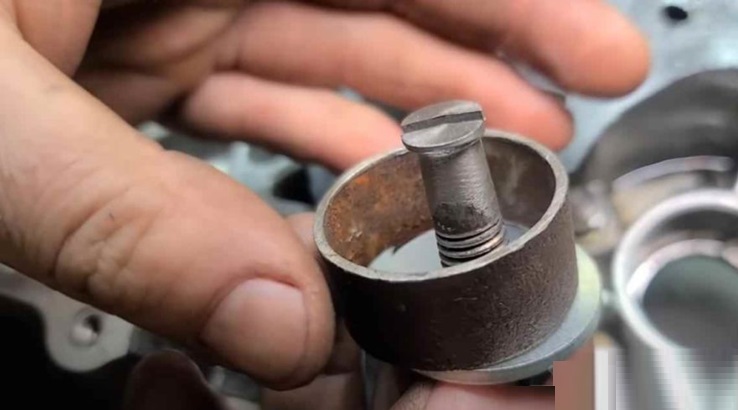 weld the cylinder with the washer and place the bolt in the center