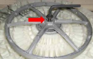 How to remove a washing machine pulley bolt