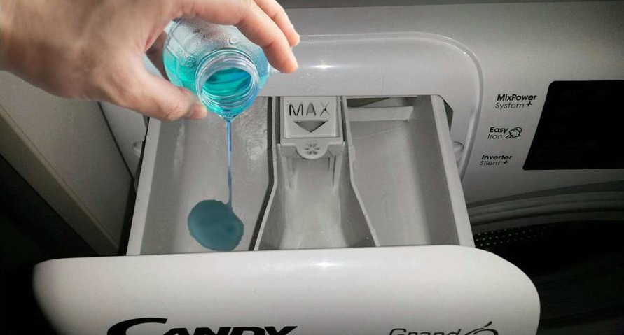 pour the gel into the Candy washing machine